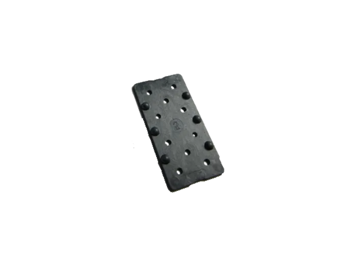 Rectangular black domino with holes.