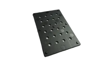 Rectangular perforated black plate with circular holes.