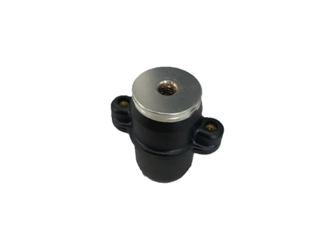 Black mechanical component with metal top and screw hole.